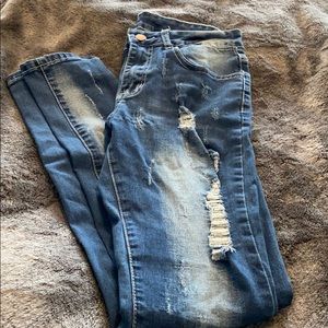 Distressed ripped jeans